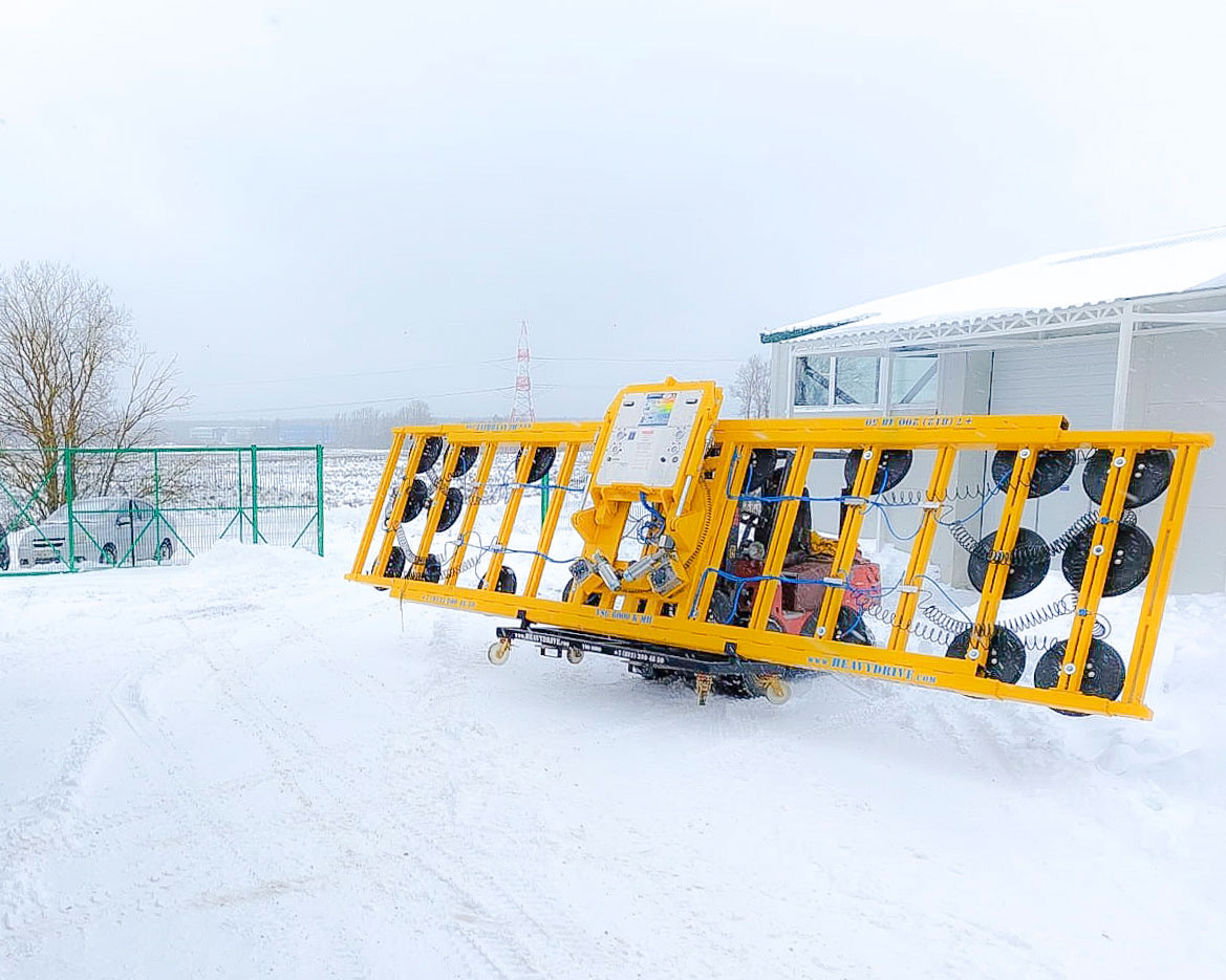 Instalarea sticlei la temperaturi sub zero grade cu un sistem de aspirație în vid